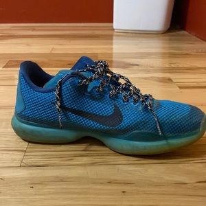 Blue Nike athletic shoes